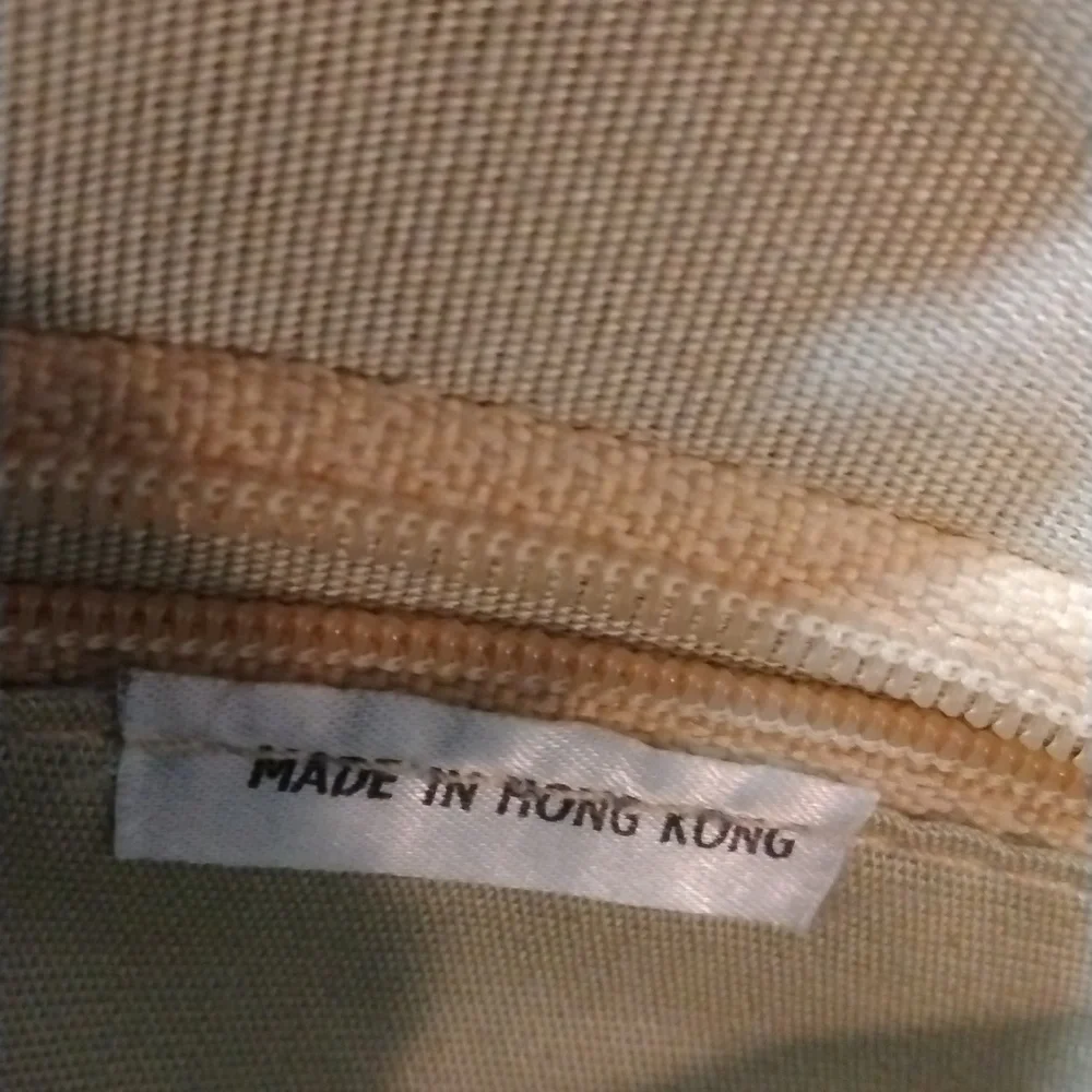 Made in Hong Kong black woven clutch